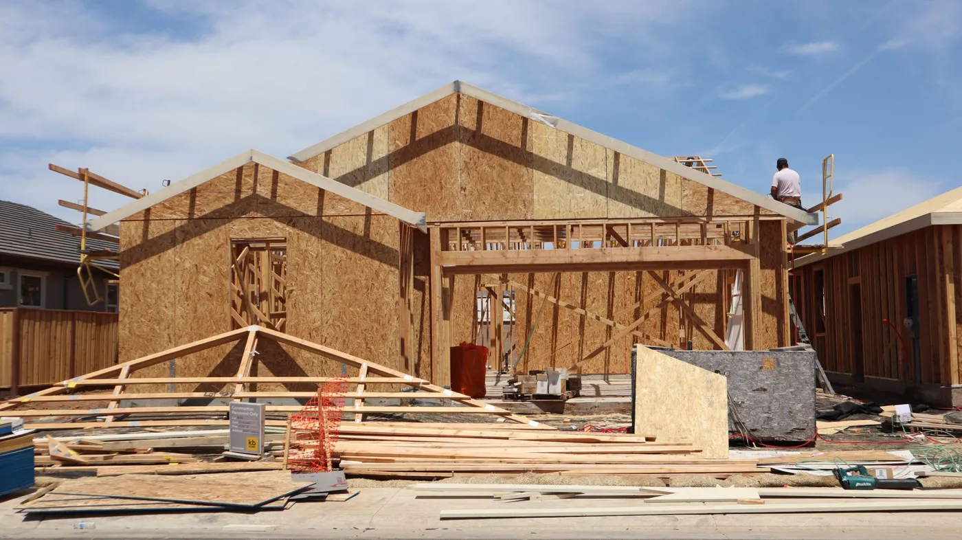 How to Create Google Ads That Actually Generate Builder Leads 2 Framing stage of a new home under construction in Elk Grove, California.