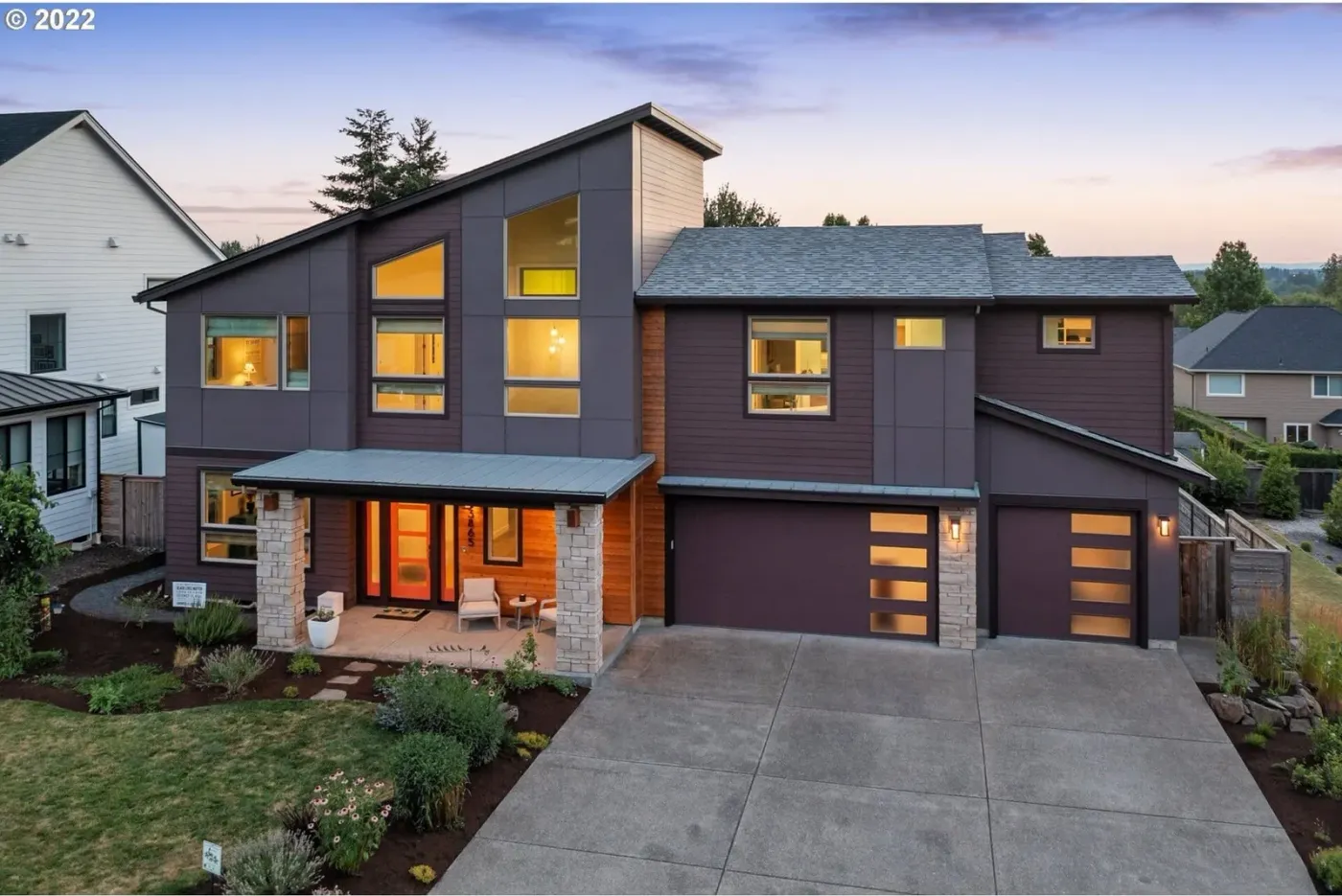 Modern house with landscaped yard